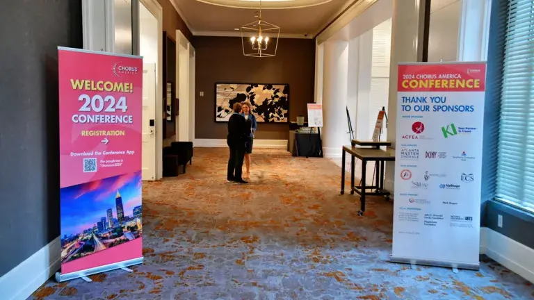 signs welcoming attendees to the 2024 Chorus America conference